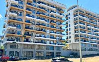Квартира 1+1, 50 м² в районе Махмутлар-id-10978-фото-1