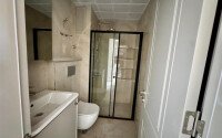 Квартира 1+1, 50 м² в районе Махмутлар-id-10978-фото-12