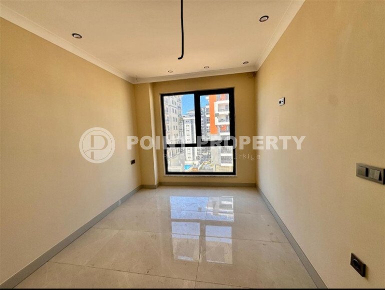 Квартира 1+1, 50 м² в районе Махмутлар-id-10978-фото-9