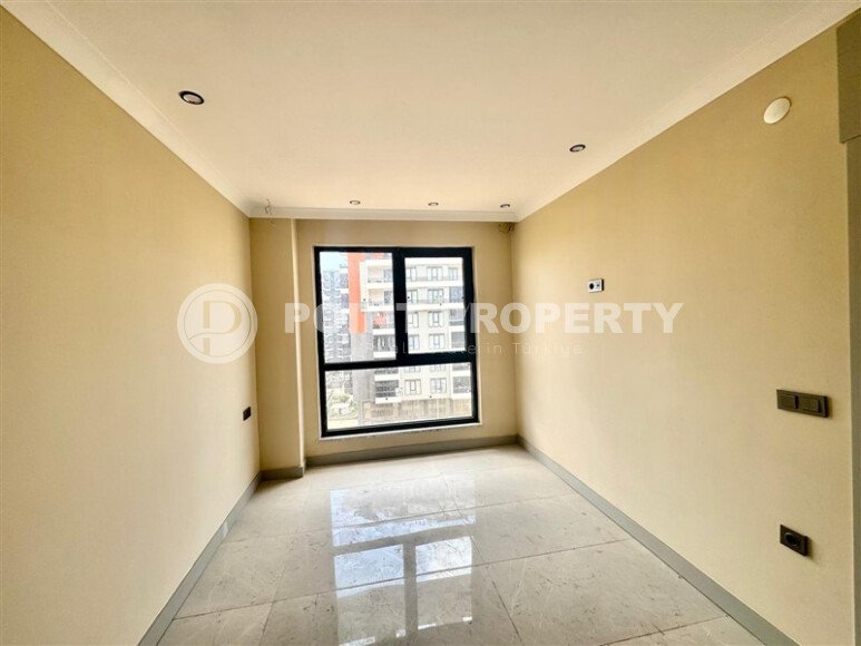 Квартира 1+1, 50 м² в районе Махмутлар-id-10978-фото-8