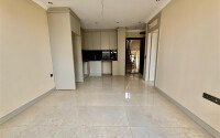 Квартира 1+1, 50 м² в районе Махмутлар-id-10978-фото-4