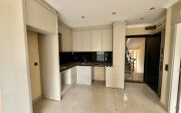 Квартира 1+1, 50 м² в районе Махмутлар-id-10978-фото-3