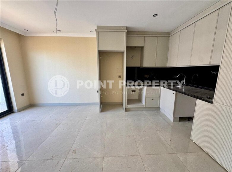 Квартира 1+1, 50 м² в районе Махмутлар-id-10978-фото-2