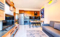 Апартаменты 1+1 50 м² в районе Махмутлар с видом на море и ВНЖ-id-10988-фото-1