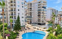 Апартаменты 1+1 площадью 70 м² в районе Тосмур с ВНЖ-id-10992-фото-2