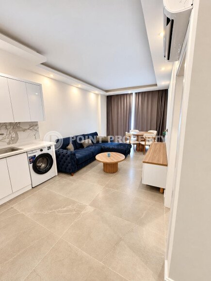 1+1 apartment with an area of 55 m² in the Kargicak district-id-10994-photo-2