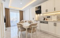 1+1 apartment, 55 m² in the center of Alanya with a sea view, residence permit-id-10995-photo-1