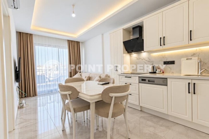 1+1 apartment, 55 m² in the center of Alanya with a sea view, residence permit-id-10995-photo-1