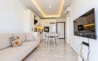 1+1 apartment, 55 m² in the center of Alanya with a sea view, residence permit-id-10995-photo-2