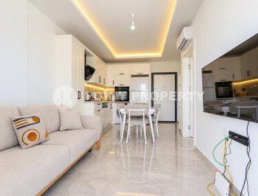 1+1 apartment, 55 m² in the center of Alanya with a sea view, residence permit-id-10995-photo-2
