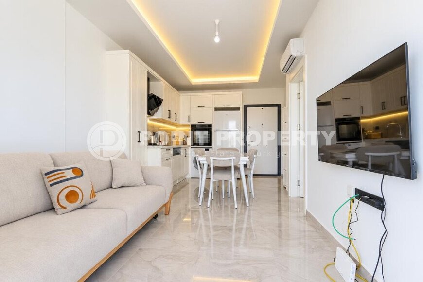 1+1 apartment, 55 m² in the center of Alanya with a sea view, residence permit-id-10995-photo-2