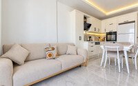 1+1 apartment, 55 m² in the center of Alanya with a sea view, residence permit-id-10995-photo-4