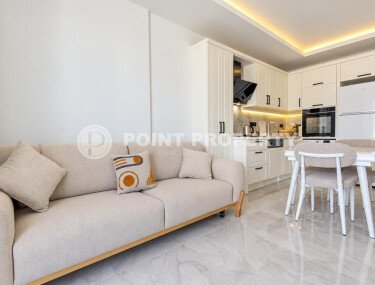 1+1 apartment, 55 m² in the center of Alanya with a sea view, residence permit-id-10995-photo-4