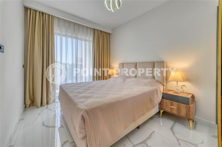 Апартаменты 1+1 площадью 61 м² в районе Каргыджак-id-10998-фото-5