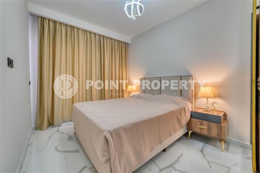 Апартаменты 1+1 площадью 61 м² в районе Каргыджак-id-10998-фото-4