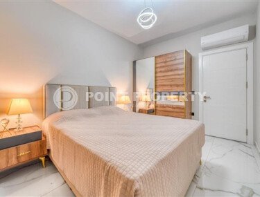 Апартаменты 1+1 площадью 61 м² в районе Каргыджак-id-10998-фото-3