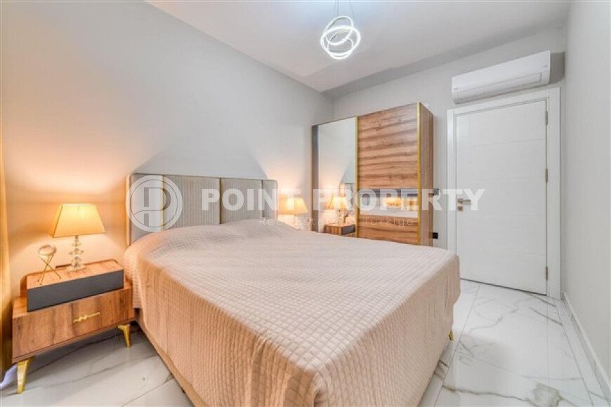 Апартаменты 1+1 площадью 61 м² в районе Каргыджак-id-10998-фото-3
