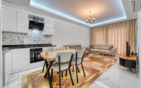 Апартаменты 1+1 площадью 61 м² в районе Каргыджак-id-10998-фото-2
