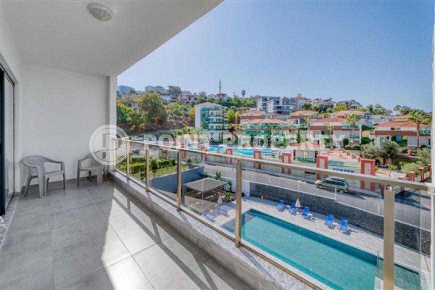 Апартаменты 1+1 площадью 61 м² в районе Каргыджак-id-10998-фото-8
