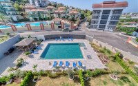 Апартаменты 1+1 площадью 61 м² в районе Каргыджак-id-10998-фото-9
