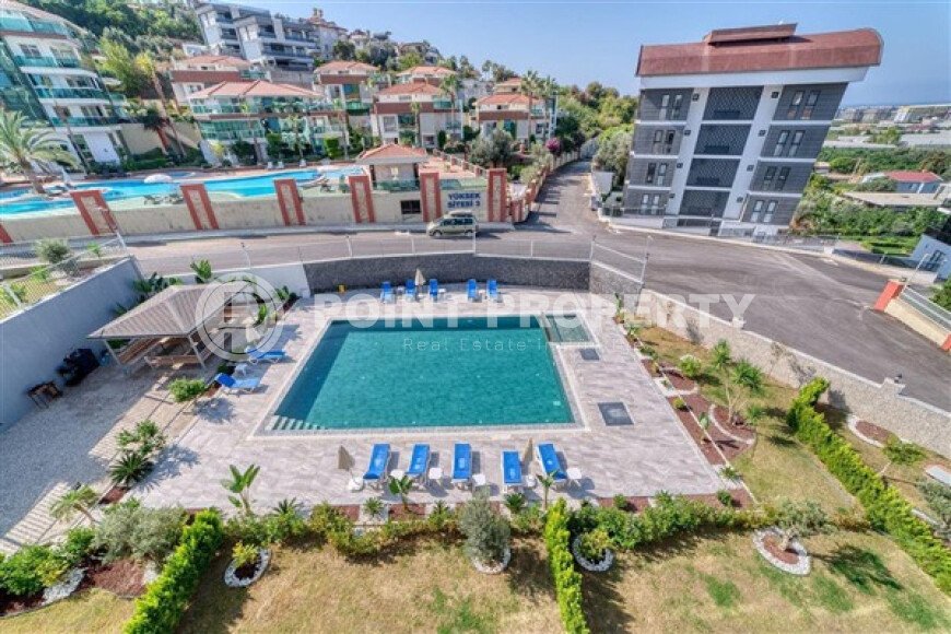 Апартаменты 1+1 площадью 61 м² в районе Каргыджак-id-10998-фото-9