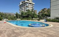 Апартаменты 1+1, 50 м² в районе Демирташ-id-11002-фото-14