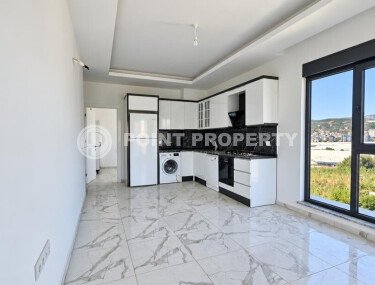 Апартаменты 1+1, 50 м² в районе Демирташ-id-11002-фото-4
