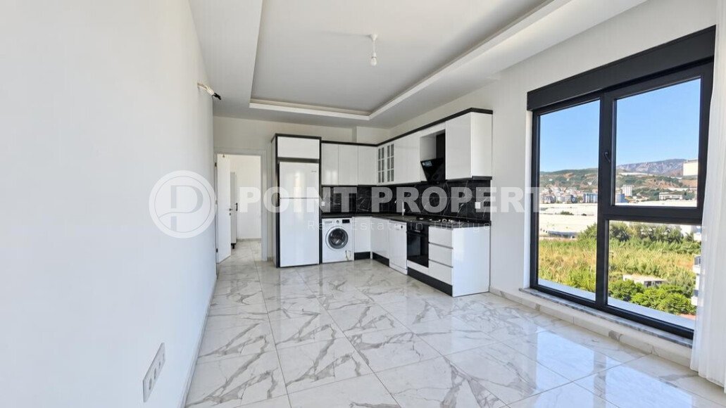 Апартаменты 1+1, 50 м² в районе Демирташ-id-11002-фото-4