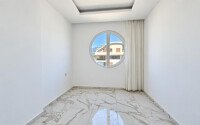 Апартаменты 1+1, 50 м² в районе Демирташ-id-11002-фото-7