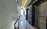 Апартаменты 1+1, 50 м² в районе Демирташ-id-11002-фото-9