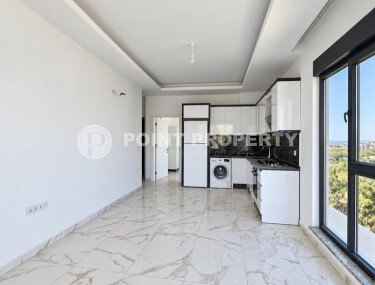 Апартаменты 1+1, 50 м² в районе Демирташ-id-11002-фото-2