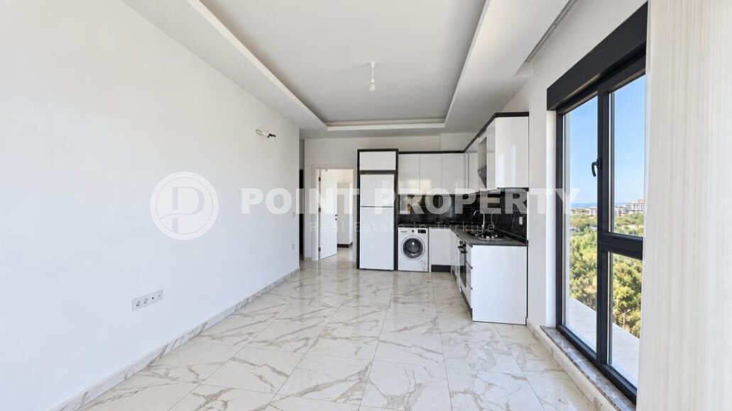 Апартаменты 1+1, 50 м² в районе Демирташ-id-11002-фото-2