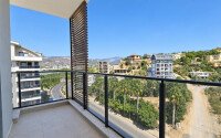Апартаменты 1+1, 50 м² в районе Демирташ-id-11002-фото-8