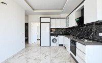 Апартаменты 1+1, 50 м² в районе Демирташ-id-11002-фото-3