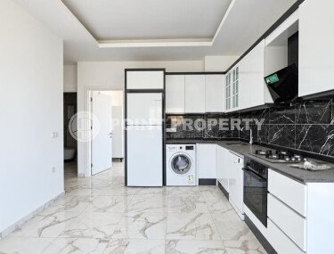 Апартаменты 1+1, 50 м² в районе Демирташ-id-11002-фото-3