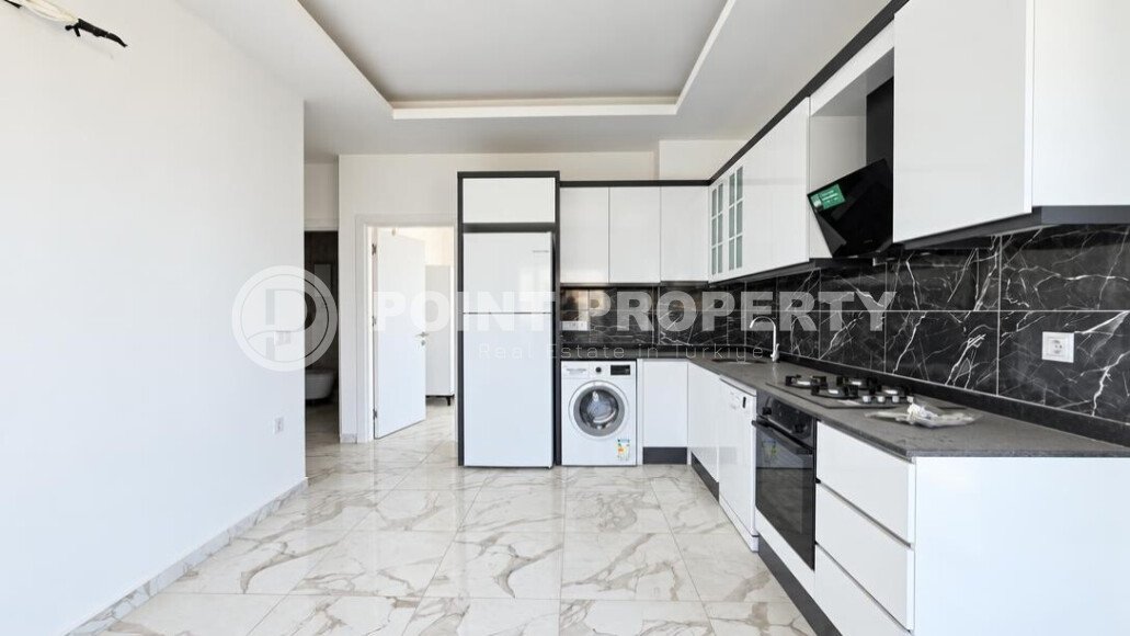 Апартаменты 1+1, 50 м² в районе Демирташ-id-11002-фото-3
