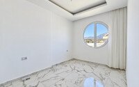 Апартаменты 1+1, 50 м² в районе Демирташ-id-11002-фото-6