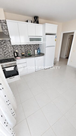 Квартира 1+1 площадью 60 м² в районе Махмутлар, 350 м до моря-id-11014-фото-4