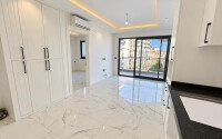 Квартира 1+1, 126,5 м² в центре Алании рядом с пляжем Клеопатры, с видом на бассейн-id-11017-фото-3