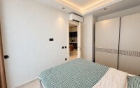 Вилла 1+1, 52 м² в районе Махмутлар — первая береговая линия, вид на море и ВНЖ-id-11018-фото-6