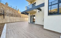 Квартира 1+1 площадью 45 м² с садом 35 м² в районе Махмутлар-id-11019-фото-8