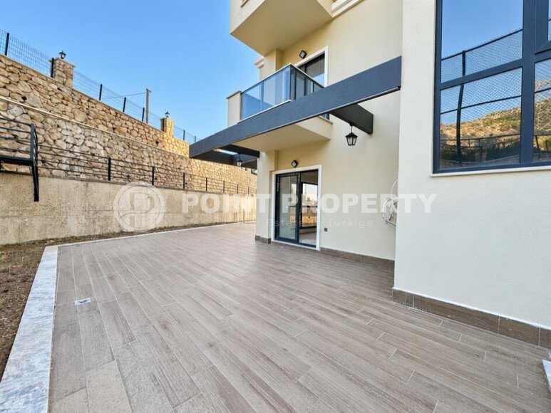 Квартира 1+1 площадью 45 м² с садом 35 м² в районе Махмутлар-id-11019-фото-8
