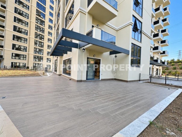 Квартира 1+1 площадью 45 м² с садом 35 м² в районе Махмутлар-id-11019-фото-9