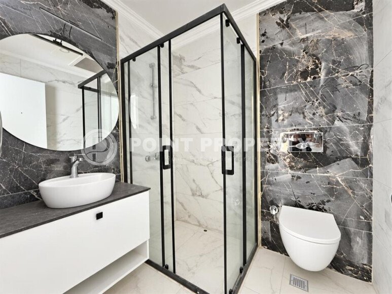 Квартира 1+1 площадью 45 м² с садом 35 м² в районе Махмутлар-id-11019-фото-7