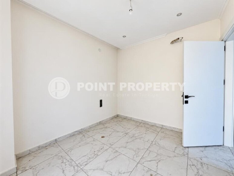 Квартира 1+1 площадью 45 м² с садом 35 м² в районе Махмутлар-id-11019-фото-6