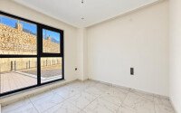 Квартира 1+1 площадью 45 м² с садом 35 м² в районе Махмутлар-id-11019-фото-4