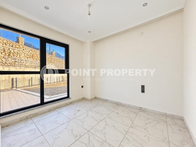 Квартира 1+1 площадью 45 м² с садом 35 м² в районе Махмутлар-id-11019-фото-4