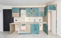 Квартира 1+1 площадью 45 м² с садом 35 м² в районе Махмутлар-id-11019-фото-5