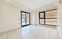 Квартира 1+1 площадью 45 м² с садом 35 м² в районе Махмутлар-id-11019-фото-2