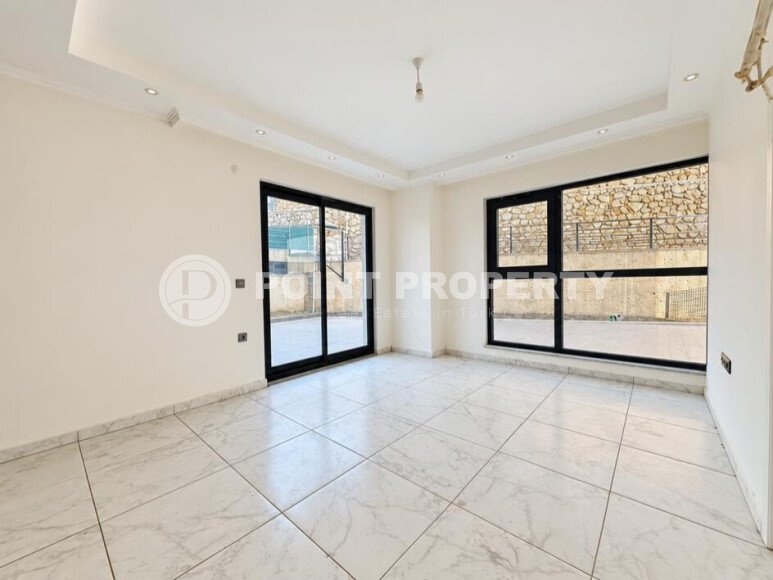 Квартира 1+1 площадью 45 м² с садом 35 м² в районе Махмутлар-id-11019-фото-2